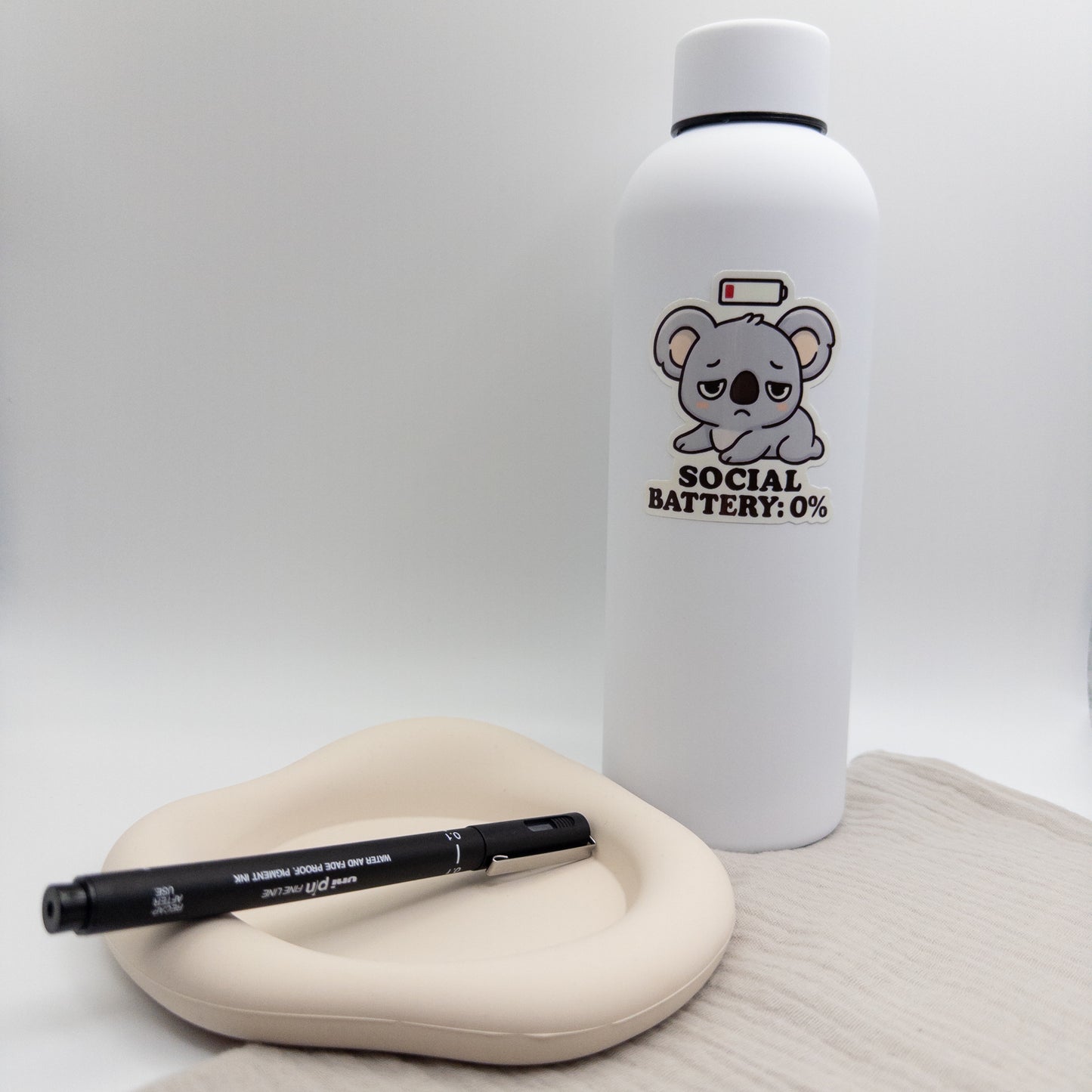 A low-battery mood meets nurturing calm in this Perth quote sticker. Soft reminder to unplug, recharge, and koala-up. — Handmade sticker — Perth, Australia