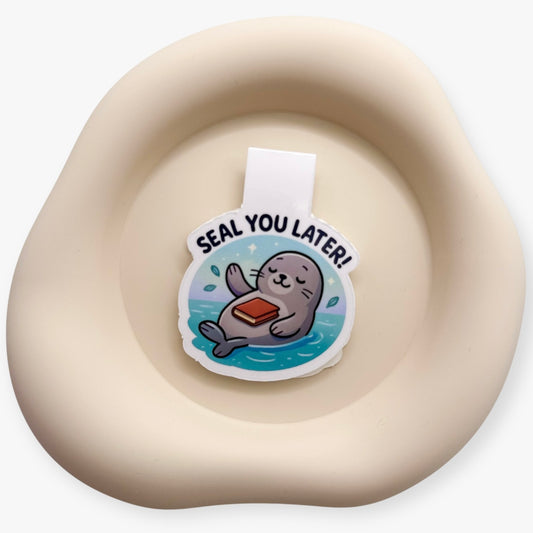 Emotionally scattered? Let this gentle seal bookmark support introverts, empaths and slow risers with a quiet goodbye that soothes.