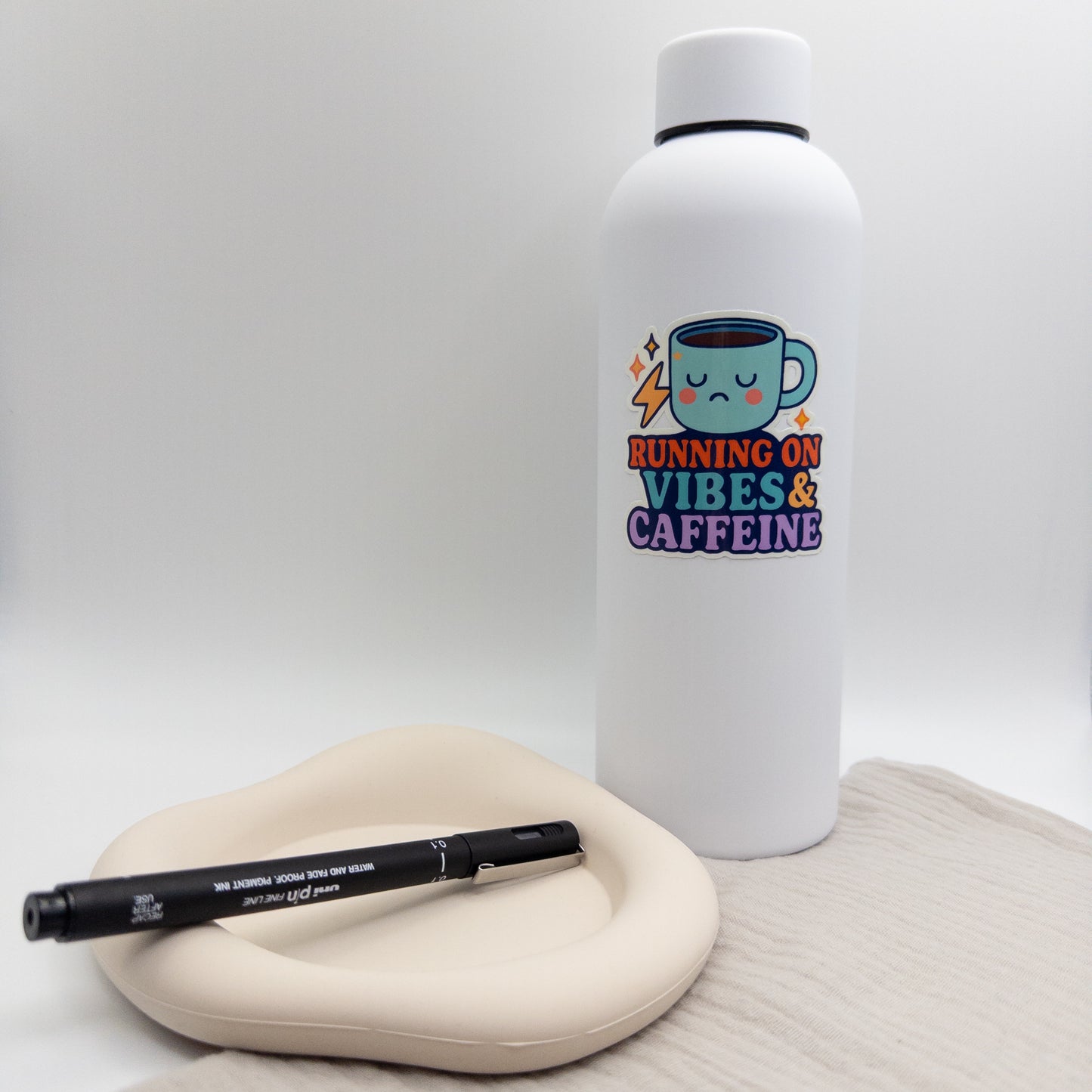 Spinning energy meets quiet regulation in this Perth caffeine quote sticker. A playful nod to self-aware chaos. — Handmade sticker — Perth, Australia