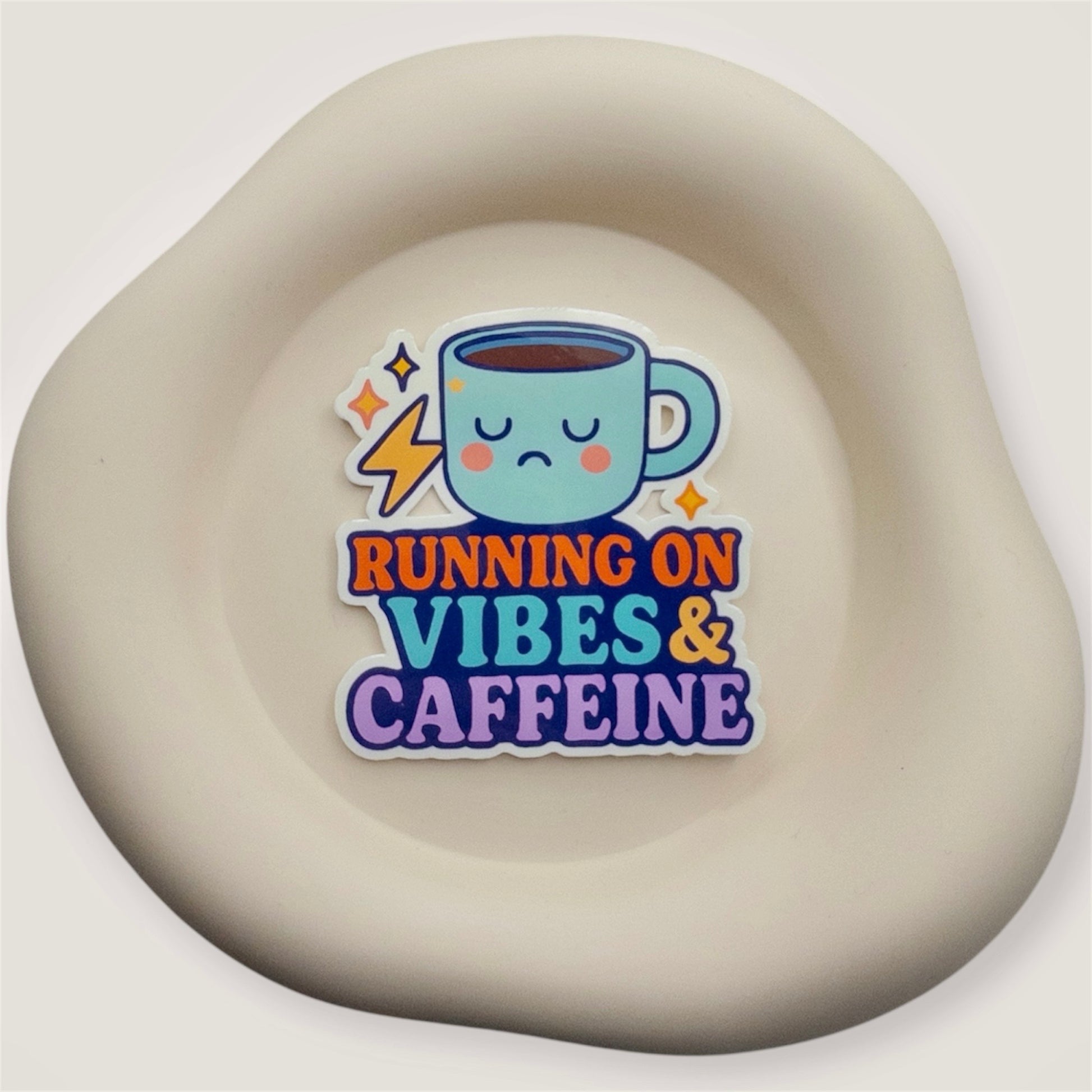 Burnt-out minds find reset with this Aussie quote sticker. Vibes & Caffeine says it all for those carrying too much, too fast.