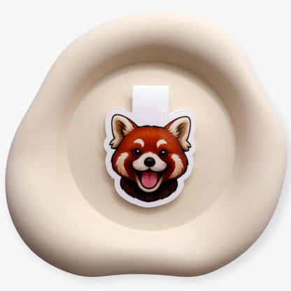 Distracted moments ease into slow flow with this red panda magnetic bookmark, ideal for thoughtful gift givers and teachers.