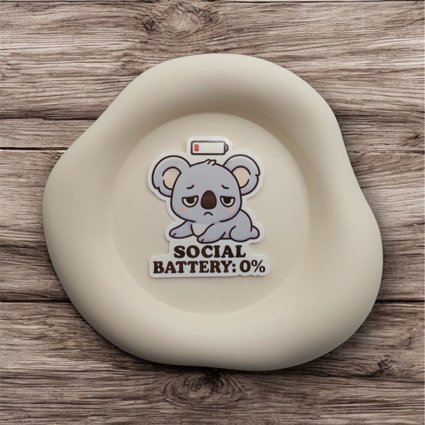 Drained and in need of retreat, this Australian koala quote sticker captures that 0% social battery moment with a gentle, cozy calm. — Handmade sticker — Perth, Australia