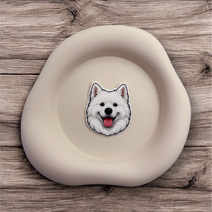 This cheerful Samoyed sticker brings softness to burnout. Made for quiet carers, emotional givers and introverts who smile through stress.