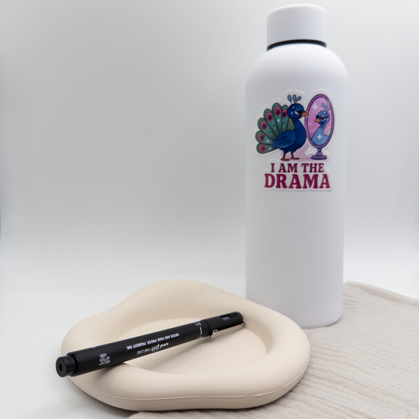 Melodramatic? Grounded? Why not both. This Perth peacock quote sticker reminds you that flair and calm can coexist in one glorious form. — Handmade sticker — Perth, Australia