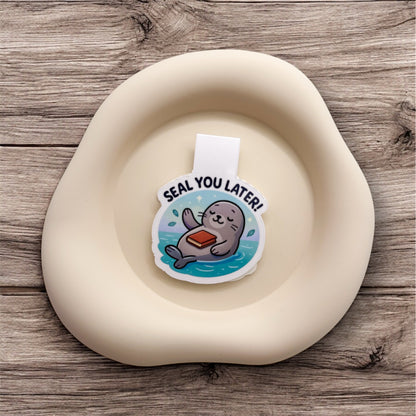 Feeling overstimulated? This soft seal magnetic bookmark offers a quiet farewell for sensitive readers who value space before they re-enter.