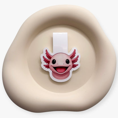 Overstimulated days soften with this axolotl bookmark, great for focused teens and those easing into quiet rituals.