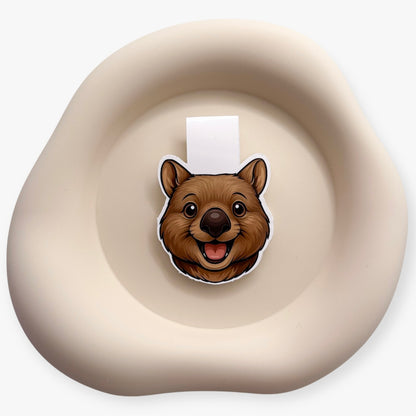 Overwhelmed readers find calm in this wombat bookmark, designed for soft-time lovers, minimalists, and gentle transitioners.