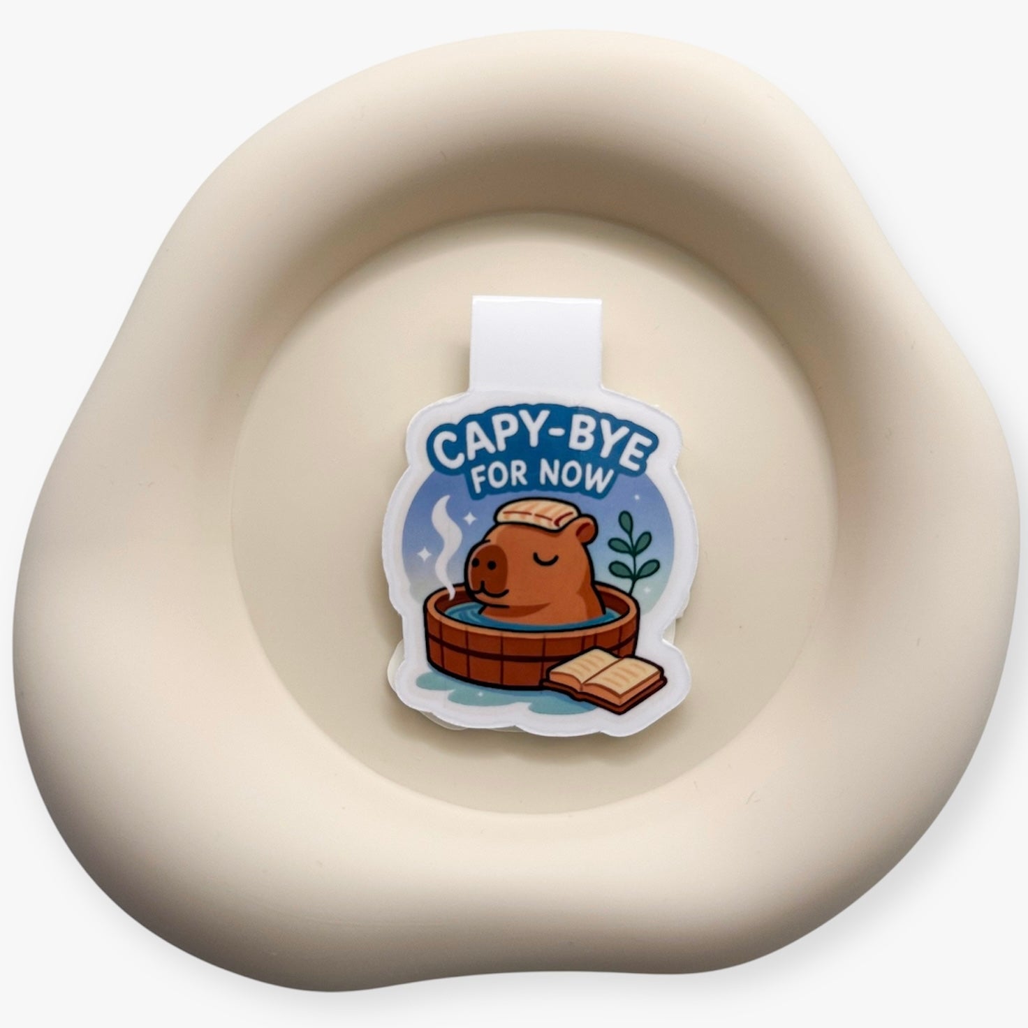 Overwhelmed by the noise? Let this gentle capy mark your pause. Perfect for sensitives, calm-seekers and slow-living book lovers.