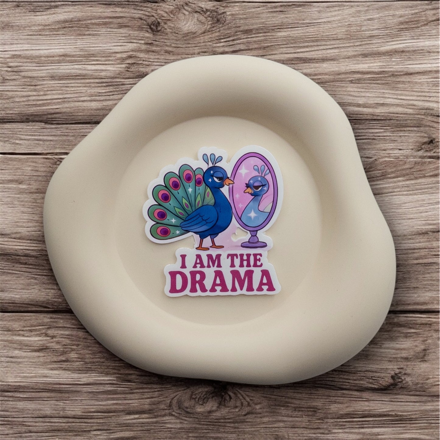 Performative energy meets gentle self-acceptance in this Australian quote sticker featuring a proud peacock. I Am the Drama, in the best way. — Handmade sticker — Perth, Australia
