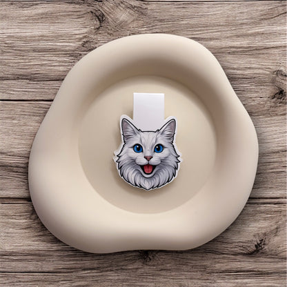 Scattered thoughts meet elegant focus with this Turkish Angora bookmark, made for detail-lovers and intuitive readers.