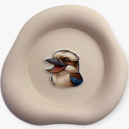 Great for pattern-noticers and early risers, this Kookaburra design channels rhythmic timing, sharp clarity and grounded humour.